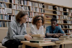 people studying inside a library